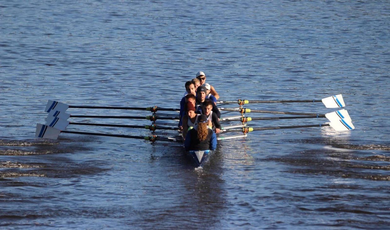 Rowing team trains on Grand River for competition.